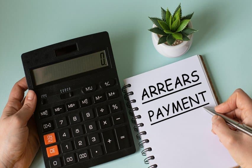 What Does Paid in Arrears Mean? image